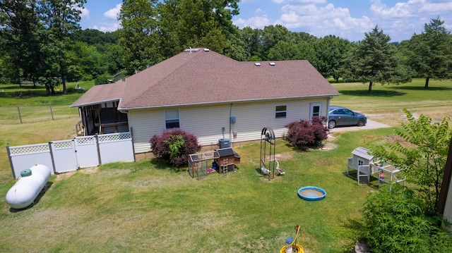 163 Hidden Hollow Dr, Marshfield, MO 65706 - view of home's exterior featuring a sunroom and roof with shingles