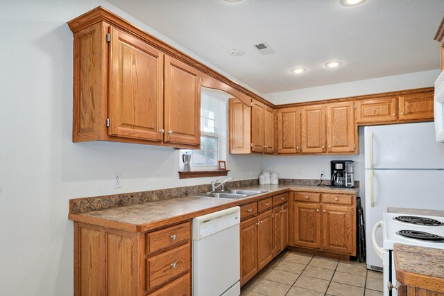 218 Tyler Ct, Mount Vernon, MO 65712 - kitchen featuring white appliances, brown cabinets, and recessed lighting