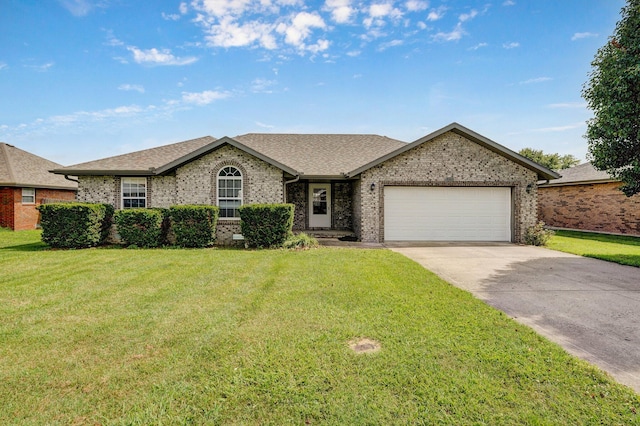 218 Tyler Ct, Mount Vernon, MO 65712 - ranch-style home featuring an attached garage, a front lawn, and brick siding