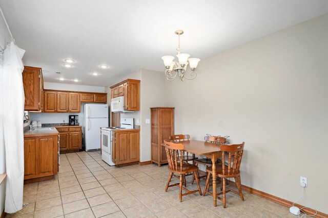 218 Tyler Ct, Mount Vernon, MO 65712 - dining space with a chandelier, light tile patterned flooring, and recessed lighting