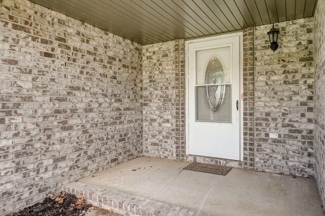 218 Tyler Ct, Mount Vernon, MO 65712 - doorway to property with brick siding