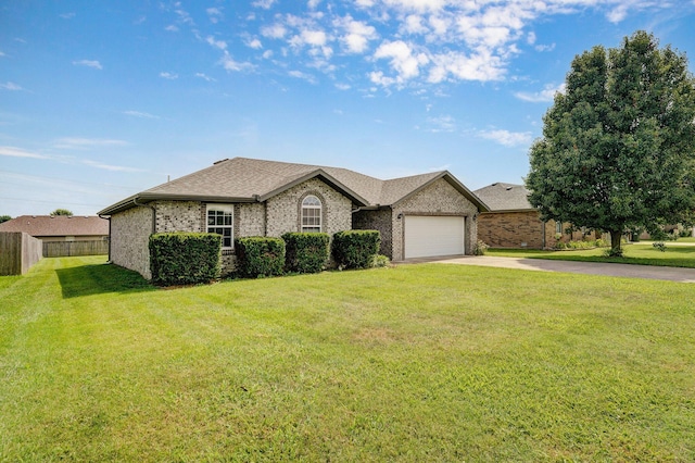 218 Tyler Ct, Mount Vernon, MO 65712 - single story home featuring driveway, an attached garage, brick siding, and roof with shingles