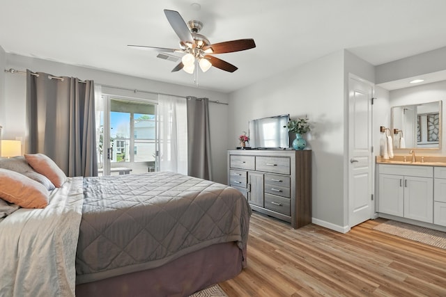 215 Meadow Brook Ln Unit 3, Branson, MO 65616 - bedroom with light wood finished floors, ensuite bath, a ceiling fan, and recessed lighting