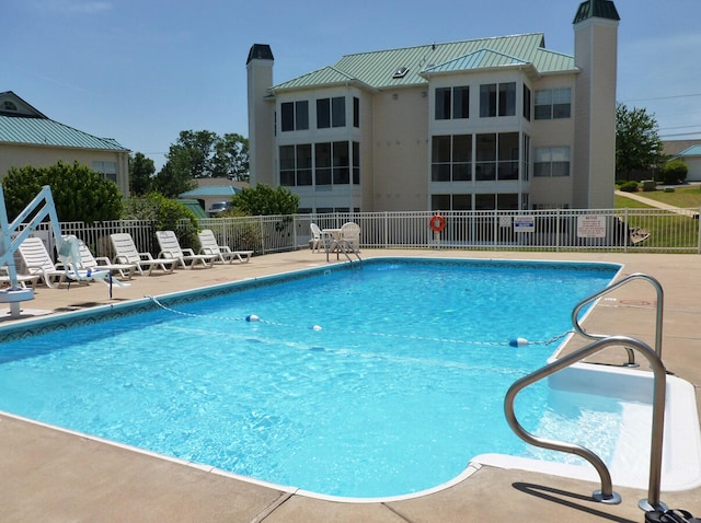 215 Meadow Brook Ln Unit 3, Branson, MO 65616 - community pool featuring a patio area