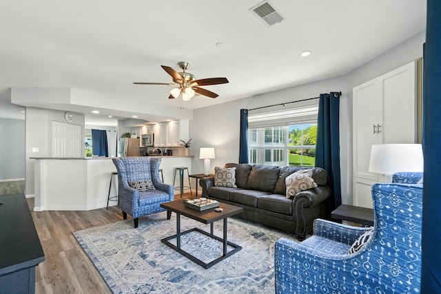 215 Meadow Brook Ln Unit 3, Branson, MO 65616 - living area with a ceiling fan, light wood-type flooring, and recessed lighting
