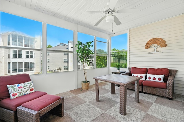 215 Meadow Brook Ln Unit 3, Branson, MO 65616 - sunroom with a ceiling fan and an outdoor living space