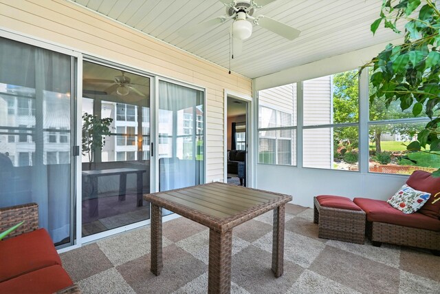 215 Meadow Brook Ln Unit 3, Branson, MO 65616 - sunroom / solarium featuring a ceiling fan and carpet floors