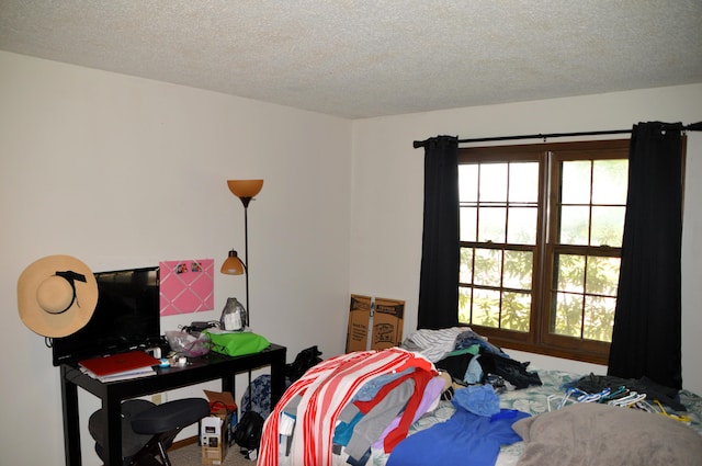 1761-1763 E Lark St, Springfield, MO 65804 - bedroom with a textured ceiling and carpet