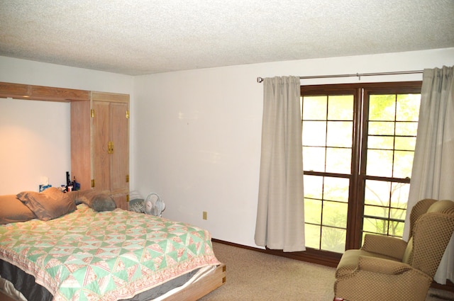 1761-1763 E Lark St, Springfield, MO 65804 - carpeted bedroom featuring multiple windows and a textured ceiling