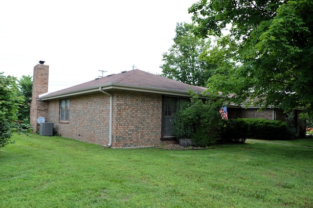 1761-1763 E Lark St, Springfield, MO 65804 - view of home's exterior with brick siding, a lawn, and a chimney