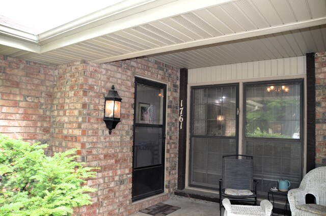 1761-1763 E Lark St, Springfield, MO 65804 - property entrance featuring brick siding and covered porch