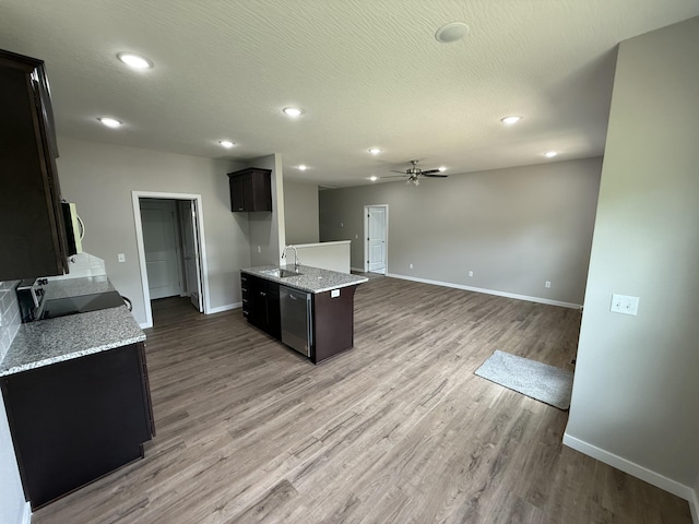 401 E Wright St, Willard, MO 65781 - kitchen with light wood-type flooring, range with electric cooktop, ceiling fan, recessed lighting, and light stone countertops