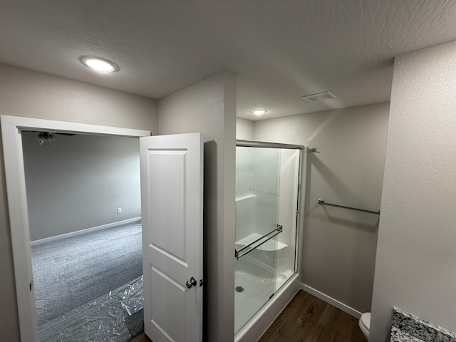 401 E Wright St, Willard, MO 65781 - bathroom featuring a shower stall and wood finished floors
