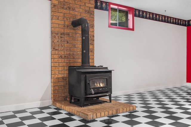 1801 W Cherokee St, Springfield, MO 65807 - detailed view of tile patterned floors and a wood stove