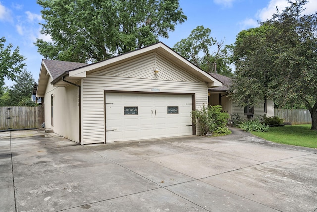 1801 W Cherokee St, Springfield, MO 65807 - ranch-style home featuring concrete driveway, a garage, and roof with shingles