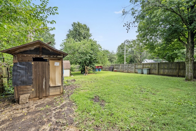 1801 W Cherokee St, Springfield, MO 65807 - fenced backyard featuring a storage shed
