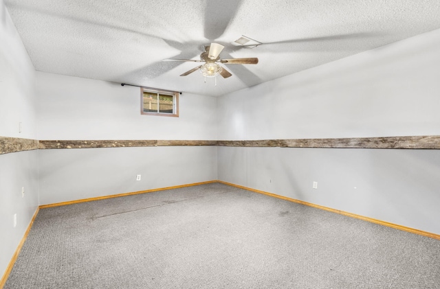 1801 W Cherokee St, Springfield, MO 65807 - spare room featuring carpet floors, ceiling fan, and a textured ceiling