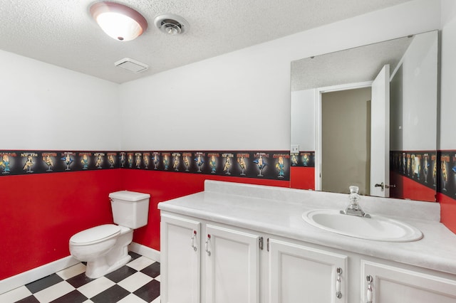 1801 W Cherokee St, Springfield, MO 65807 - bathroom with tile patterned floors, vanity, and a textured ceiling