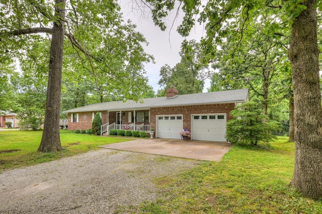 1706 Ankney Pl, Neosho, MO 64850 - ranch-style home with driveway, covered porch, brick siding, a front yard, and a garage