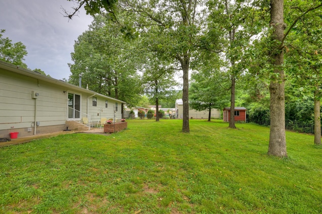 1706 Ankney Pl, Neosho, MO 64850 - view of yard featuring entry steps and a shed