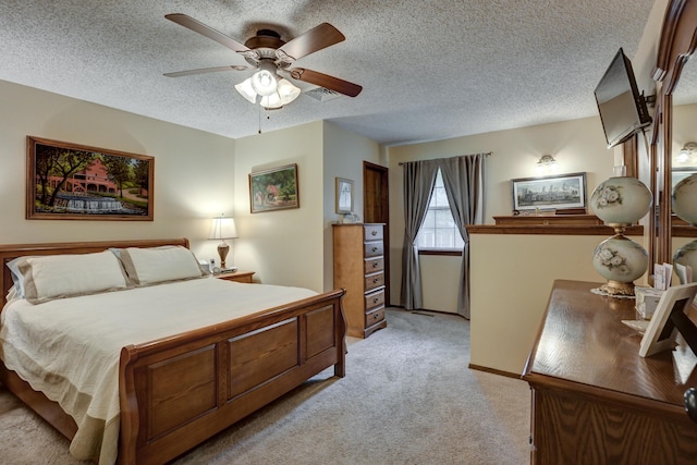 1706 Ankney Pl, Neosho, MO 64850 - bedroom with light colored carpet, a textured ceiling, and ceiling fan