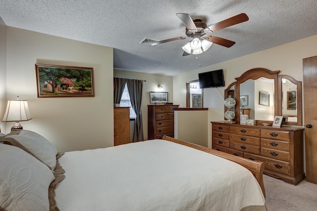 1706 Ankney Pl, Neosho, MO 64850 - bedroom featuring carpet, a textured ceiling, and ceiling fan