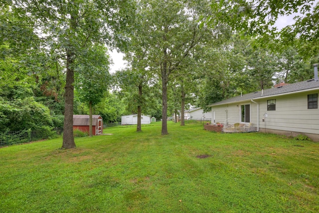 1706 Ankney Pl, Neosho, MO 64850 - view of yard featuring a shed