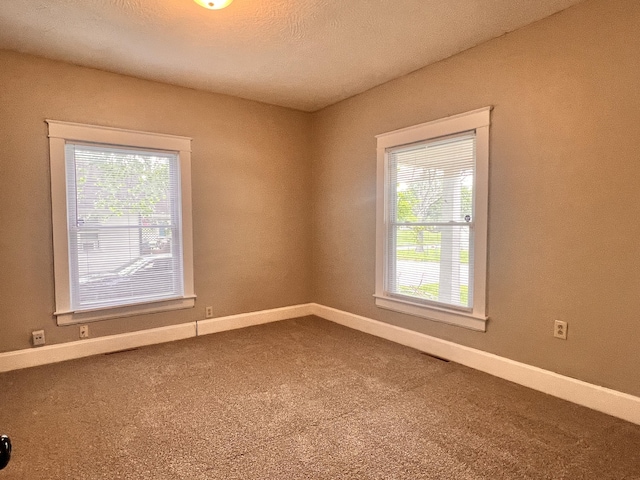 1322 W Atlantic St, Springfield, MO 65803 - carpeted spare room with baseboards
