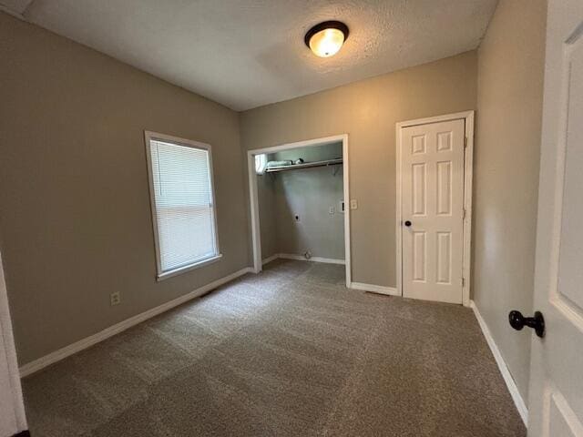 1322 W Atlantic St, Springfield, MO 65803 - unfurnished bedroom featuring carpet floors and a closet