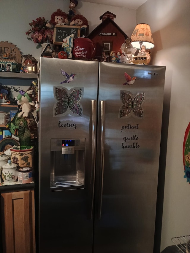231 W School St, Everton, MO 65646 - detailed view of stainless steel fridge with ice dispenser