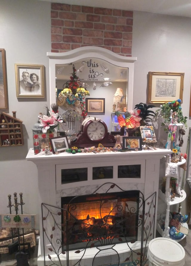 231 W School St, Everton, MO 65646 - detailed view of a lit fireplace