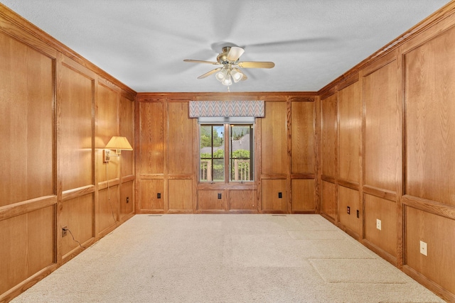 4081 E Kingsbury St, Springfield, MO 65809 - carpeted spare room featuring a ceiling fan and wooden walls