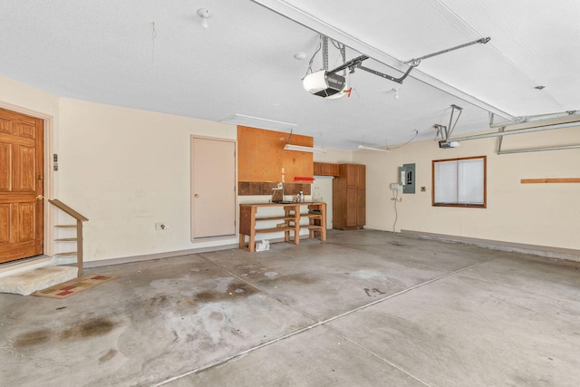 4081 E Kingsbury St, Springfield, MO 65809 - garage with electric panel and a garage door opener