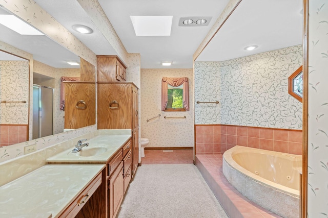 4081 E Kingsbury St, Springfield, MO 65809 - full bath with wallpapered walls, vanity, a tub with jets, and a stall shower