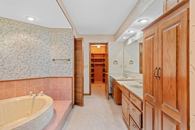 4081 E Kingsbury St, Springfield, MO 65809 - full bathroom featuring wallpapered walls, double vanity, and a jetted tub
