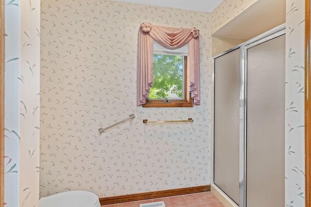 4081 E Kingsbury St, Springfield, MO 65809 - bathroom with a stall shower, wallpapered walls, and tile patterned flooring