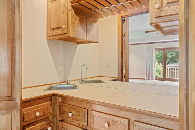 4081 E Kingsbury St, Springfield, MO 65809 - kitchen with light countertops and light brown cabinetry