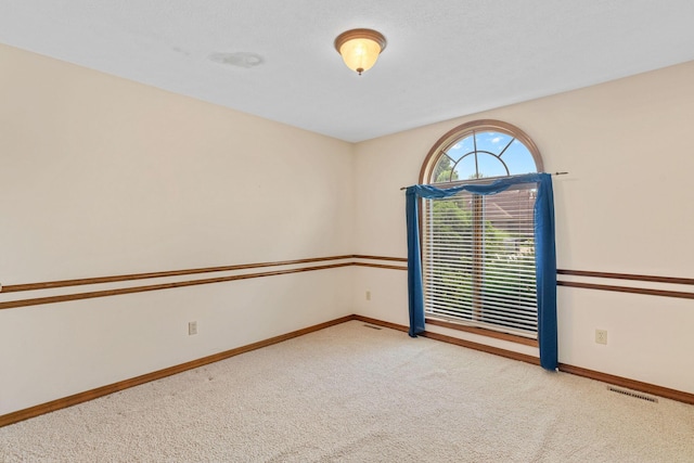 4081 E Kingsbury St, Springfield, MO 65809 - empty room featuring carpet floors and baseboards