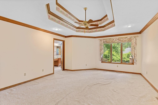 4081 E Kingsbury St, Springfield, MO 65809 - empty room with crown molding, a raised ceiling, light carpet, and ceiling fan