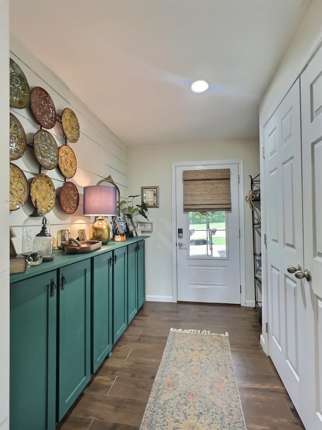 556 Carter 309, Van Buren, MO 63965 - doorway to outside with recessed lighting, dark wood-style floors, and wood walls
