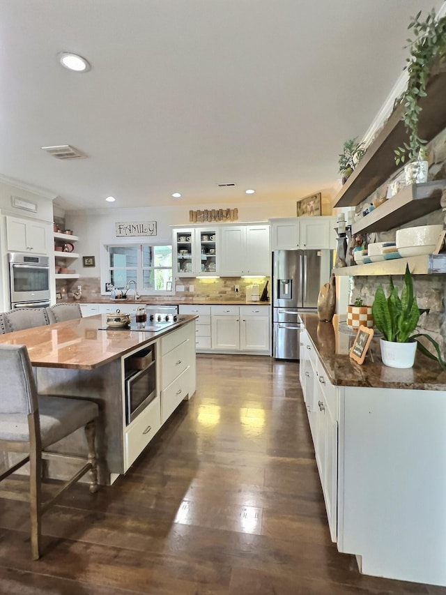 556 Carter 309, Van Buren, MO 63965 - kitchen featuring open shelves, stainless steel appliances, white cabinetry, a kitchen island, and recessed lighting
