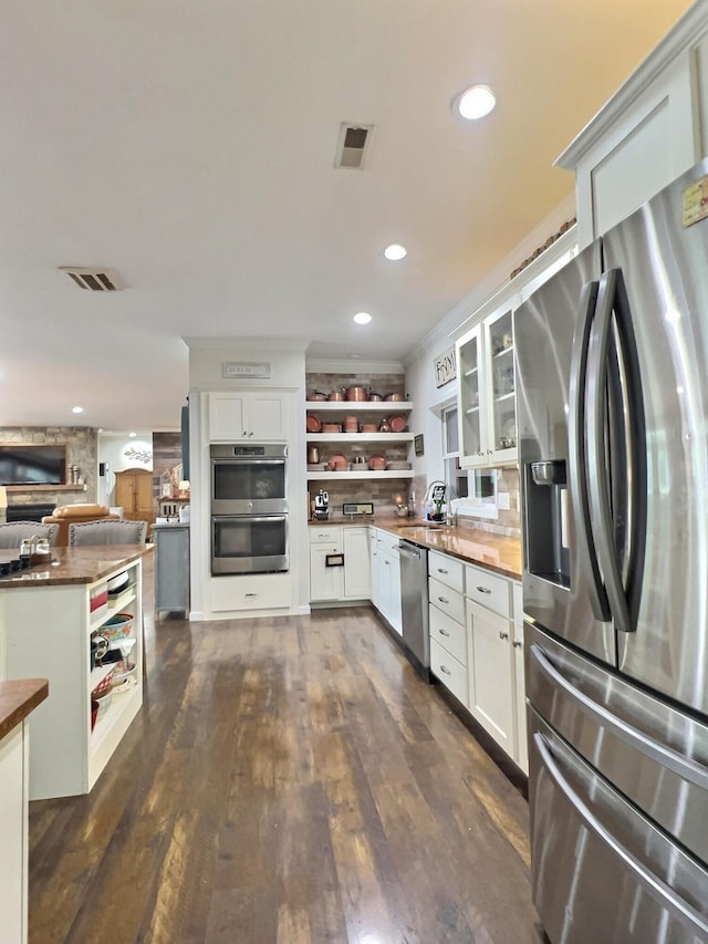 556 Carter 309, Van Buren, MO 63965 - kitchen with appliances with stainless steel finishes, open shelves, dark wood-style floors, white cabinets, and recessed lighting