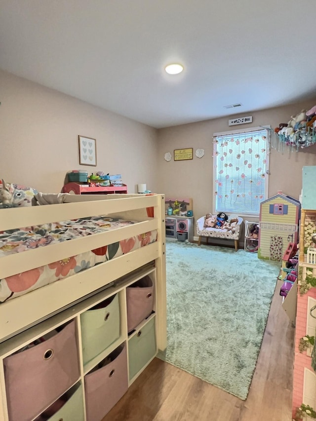 556 Carter 309, Van Buren, MO 63965 - bedroom featuring wood finished floors