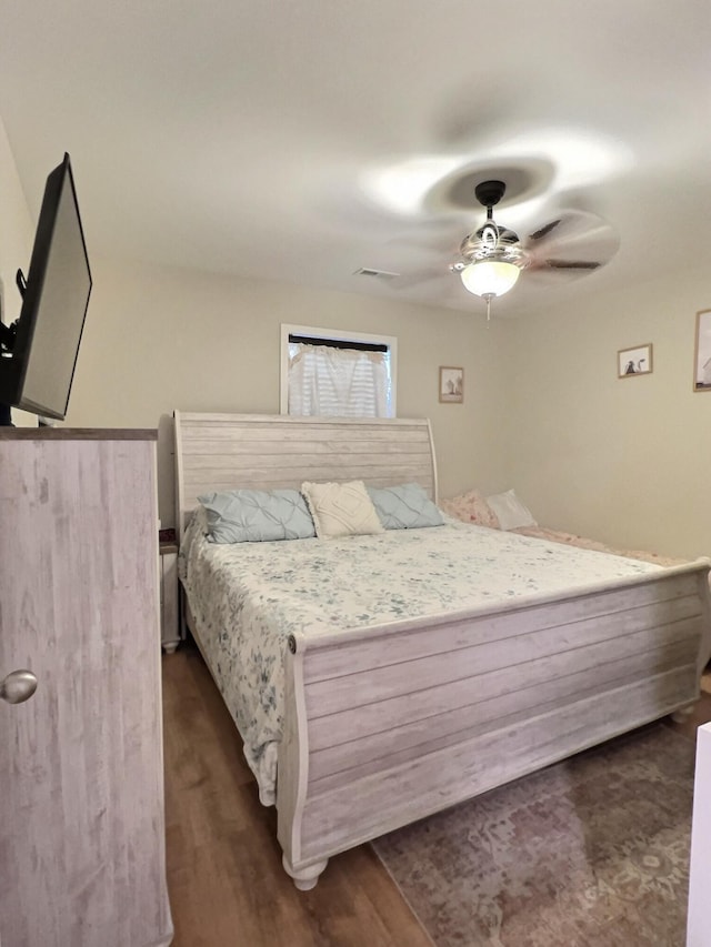 556 Carter 309, Van Buren, MO 63965 - bedroom with dark wood-style flooring and a ceiling fan