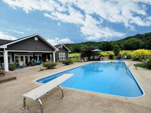 556 Carter 309, Van Buren, MO 63965 - outdoor pool with a diving board and a patio
