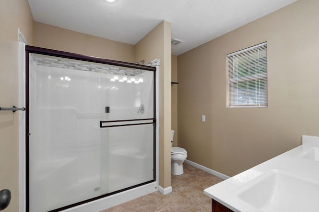5834 Geranium Ln, Battlefield, MO 65619 - bathroom featuring a stall shower, double vanity, and tile patterned floors