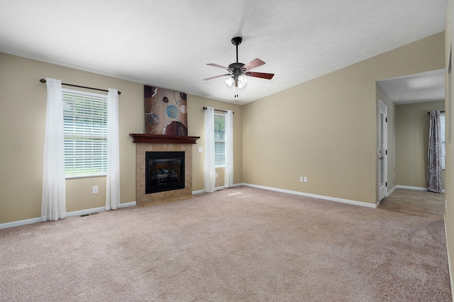 5834 Geranium Ln, Battlefield, MO 65619 - unfurnished living room featuring ceiling fan, a fireplace, and carpet floors