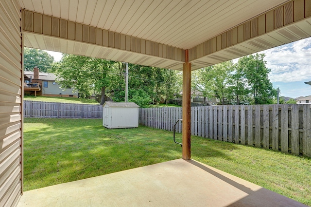 5834 Geranium Ln, Battlefield, MO 65619 - fenced backyard with a patio area and a storage shed