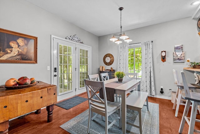 701 E Bayshore Dr, Ozark, MO 65721 - dining area featuring wood finished floors and a chandelier