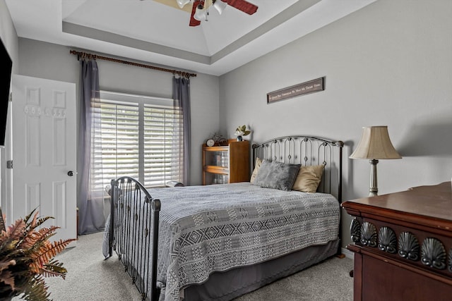 701 E Bayshore Dr, Ozark, MO 65721 - carpeted bedroom with ceiling fan and a raised ceiling